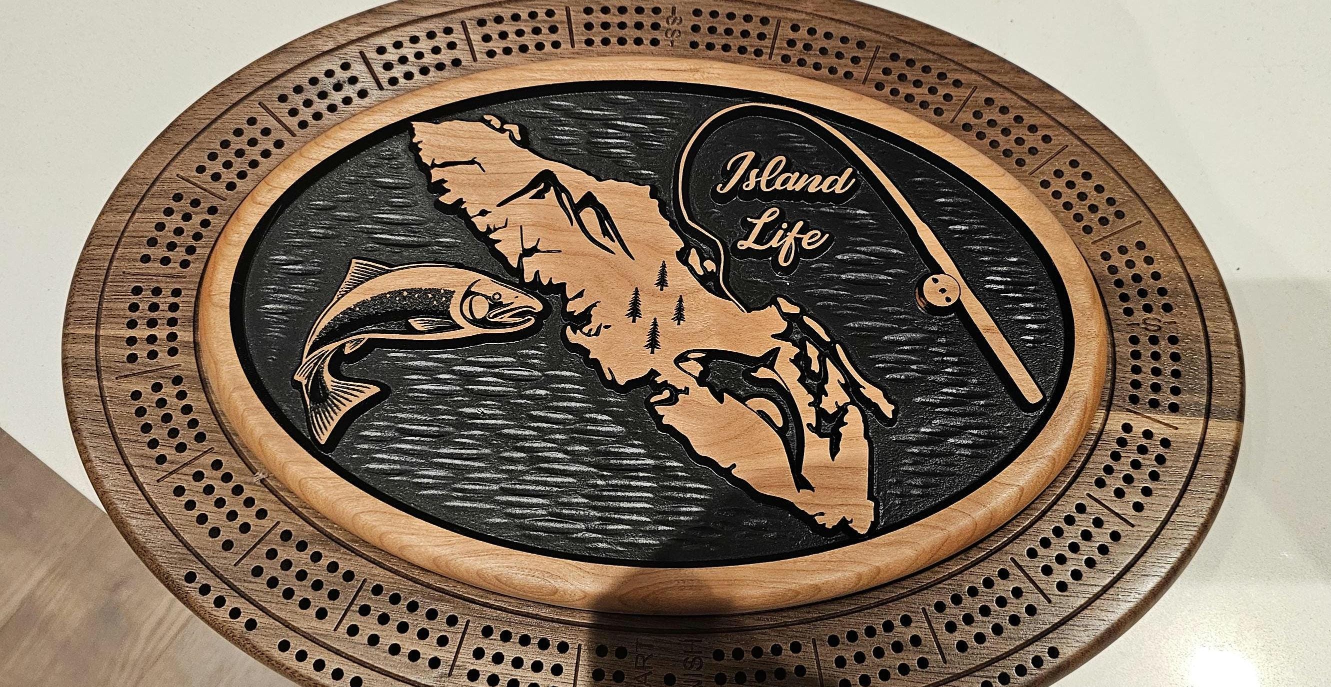 Vancouver island crib board , fish, fishing rod, orca