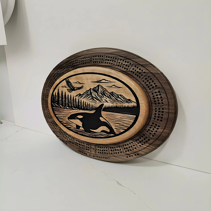 Handcrafted Orca and Eagle Cribbage Board  Custom-Engraved Wooden Game featuring integrated card storage.