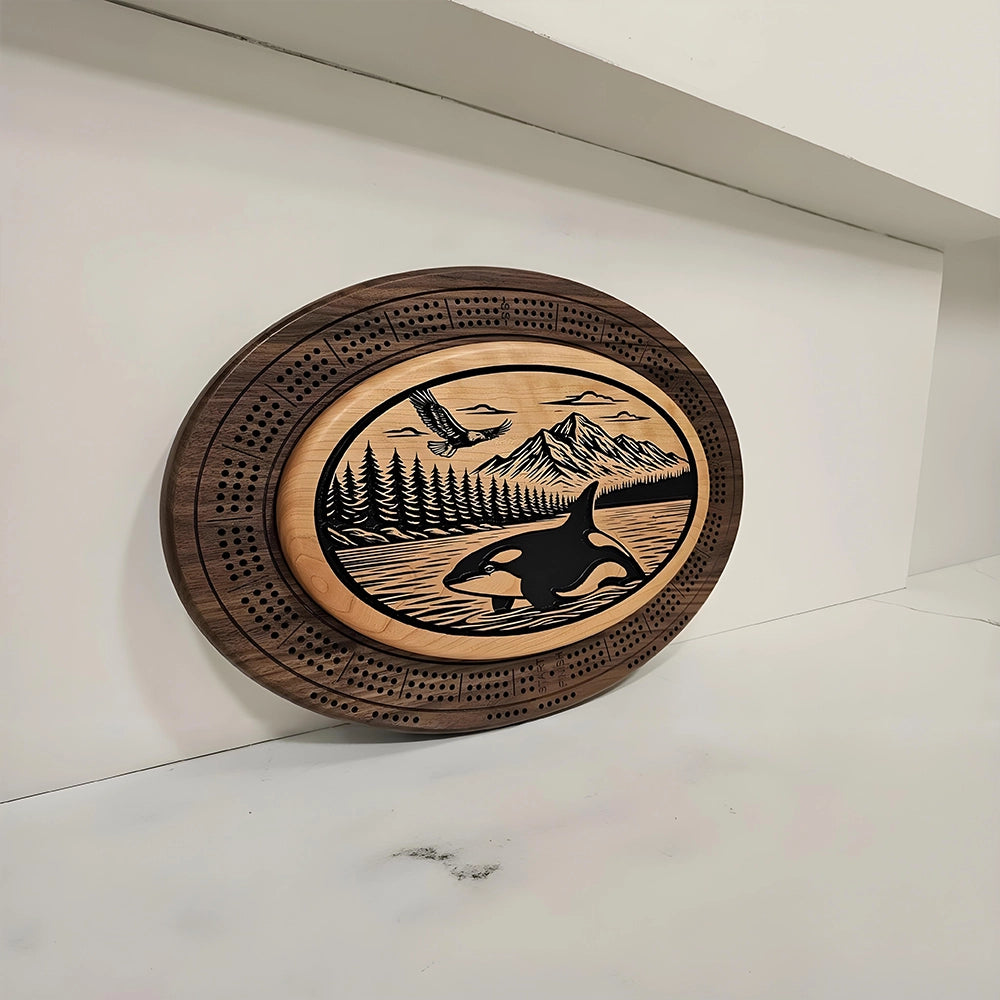 Handcrafted Orca and Eagle Cribbage Board  Custom-Engraved Wooden Game featuring integrated card storage.