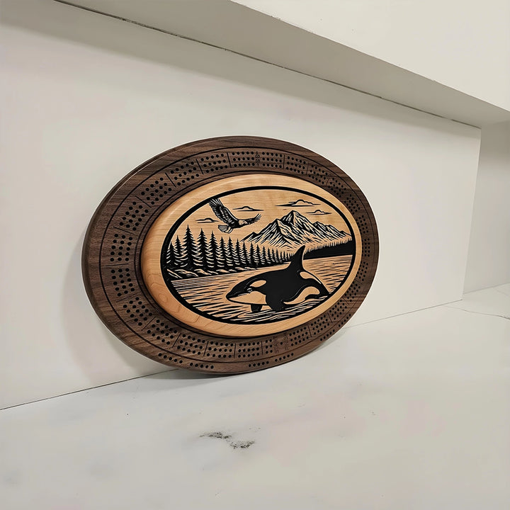 Handcrafted Orca and Eagle Cribbage Board  Custom-Engraved Wooden Game featuring integrated card storage.